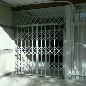 درب آکاردئونی حفاظ آهنی در بومهن