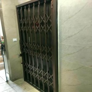 درب آکاردئونی حفاظ آهنی در بیرجند