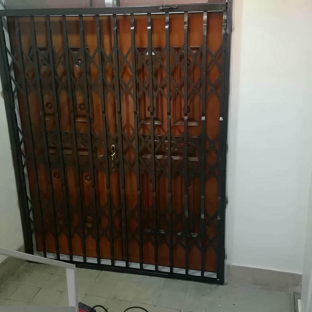 خرید درب آکاردئونی آهنی طرح تقویت‌شده در مشهد