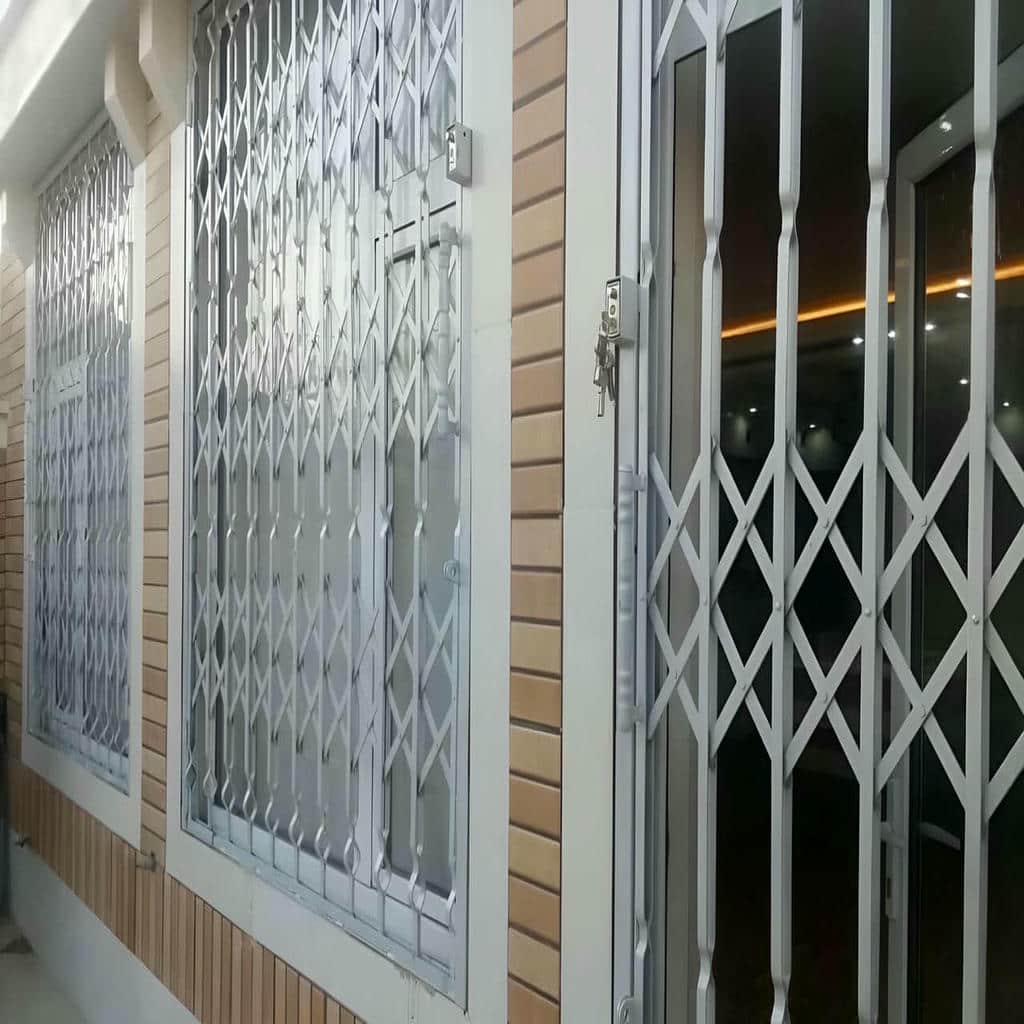 نصب درب آکاردئونی حفاظ آهنی ضدسرقت در ملارد