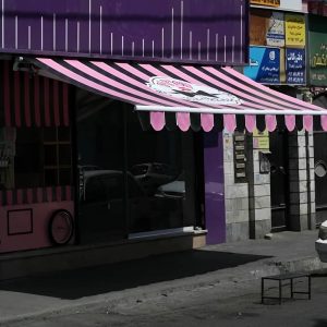 سایبان برقی مجهز به سنسور باد و باران با حسگر باد روی سازه بیرونی سایبان برقی مجهز به سنسور باد و باران