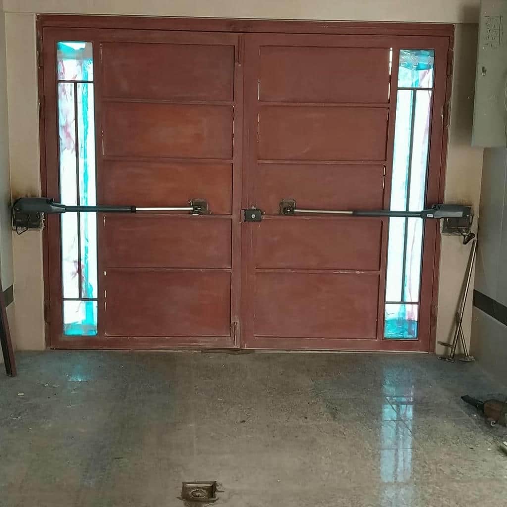 تعمیر جک درب پارکینگ با اصلاح اتصالات مکانیکی تعمیر جک درب پارکینگ با اصلاح اتصالات مکانیکی