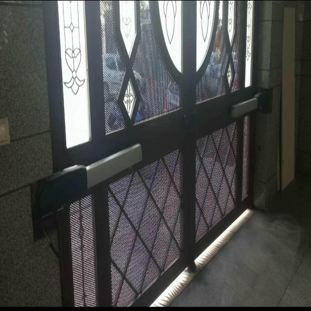 خدمات تنظیم جک درب پارکینگ ایرانی بازویی پس از نصب